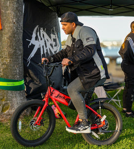 Rider-In-A-Protective-Shirt-On-A-Bicycle